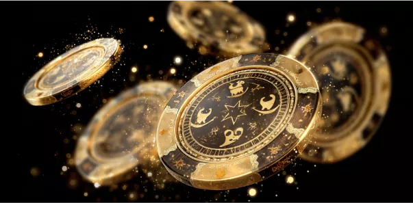 Zelta kazino žetoni ar zodiaka zīmēm
